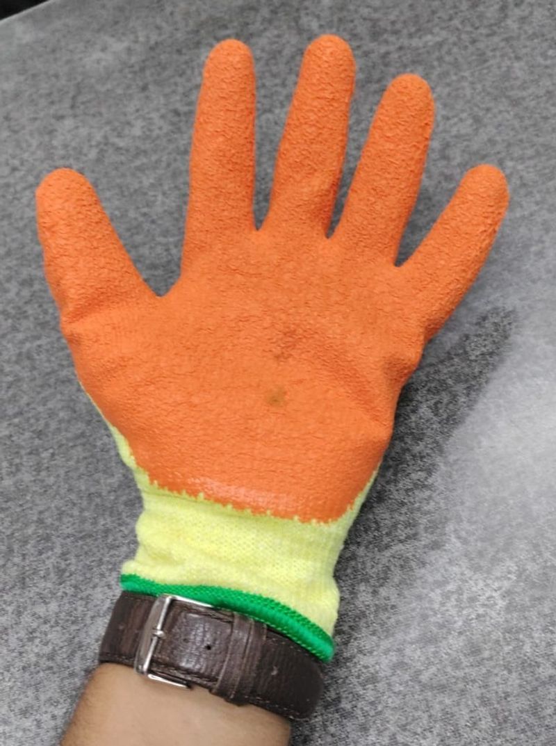 Orange yellow latex coated gloves pair