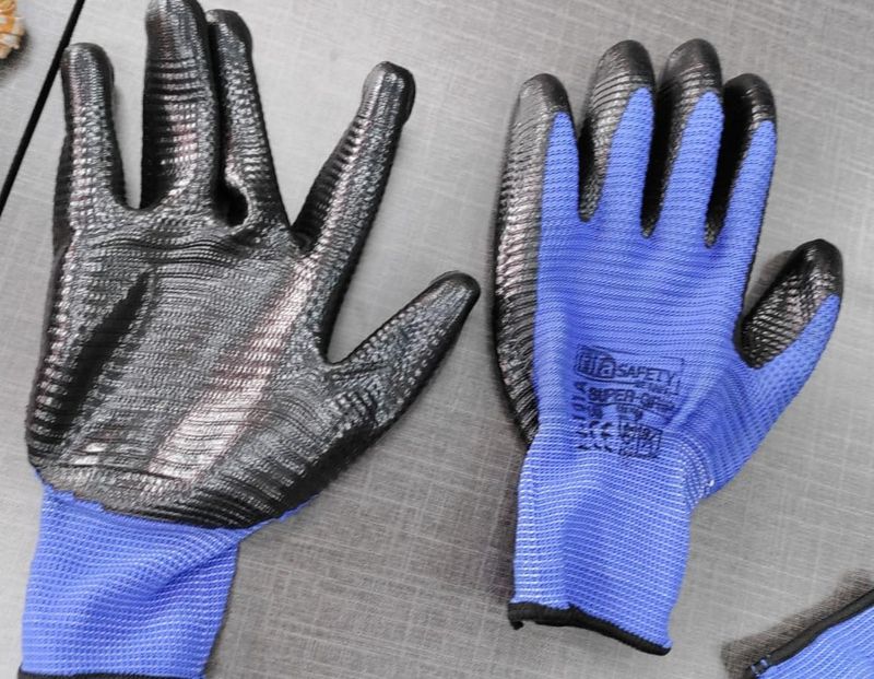 Blue black Nitrile coated hand gloves Pair