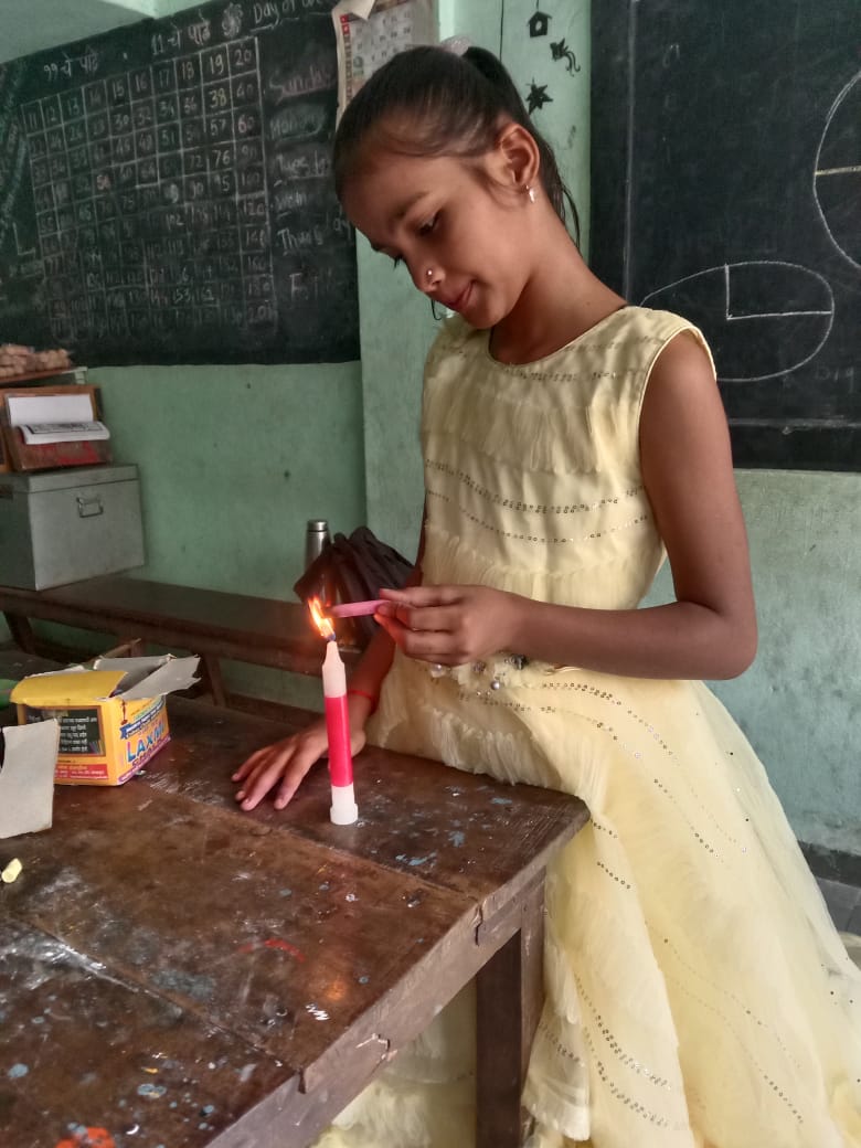 Children building science models in classroom
