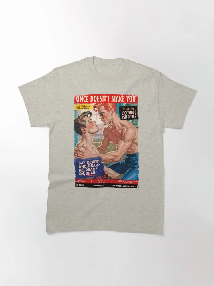 A light grey t-shirt featuring the 'Once Doesn't Make You' gay pulp fiction poster design.