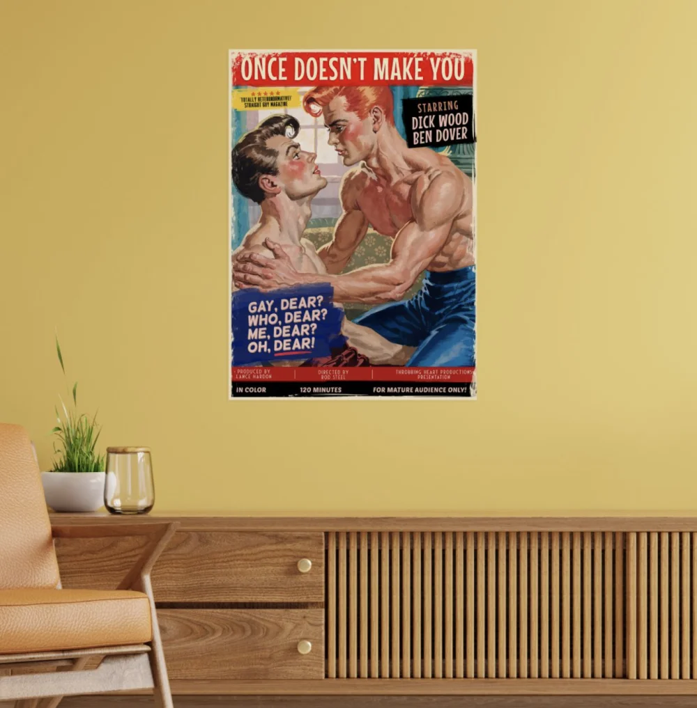 The 'Once Doesn't Make You' gay pulp fiction poster displayed on a wall above a wooden cabinet.