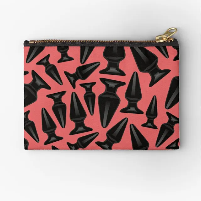 Black butt plugs on zipper pouch.