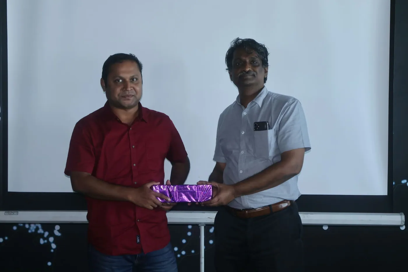 Receiving a token of appreciation at the Exasol Chennai Chapter meetup