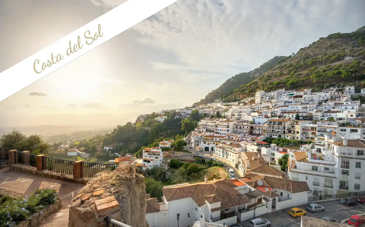 Costa del Sol coastal town with Mediterranean buildings and sunny seaside landscape
