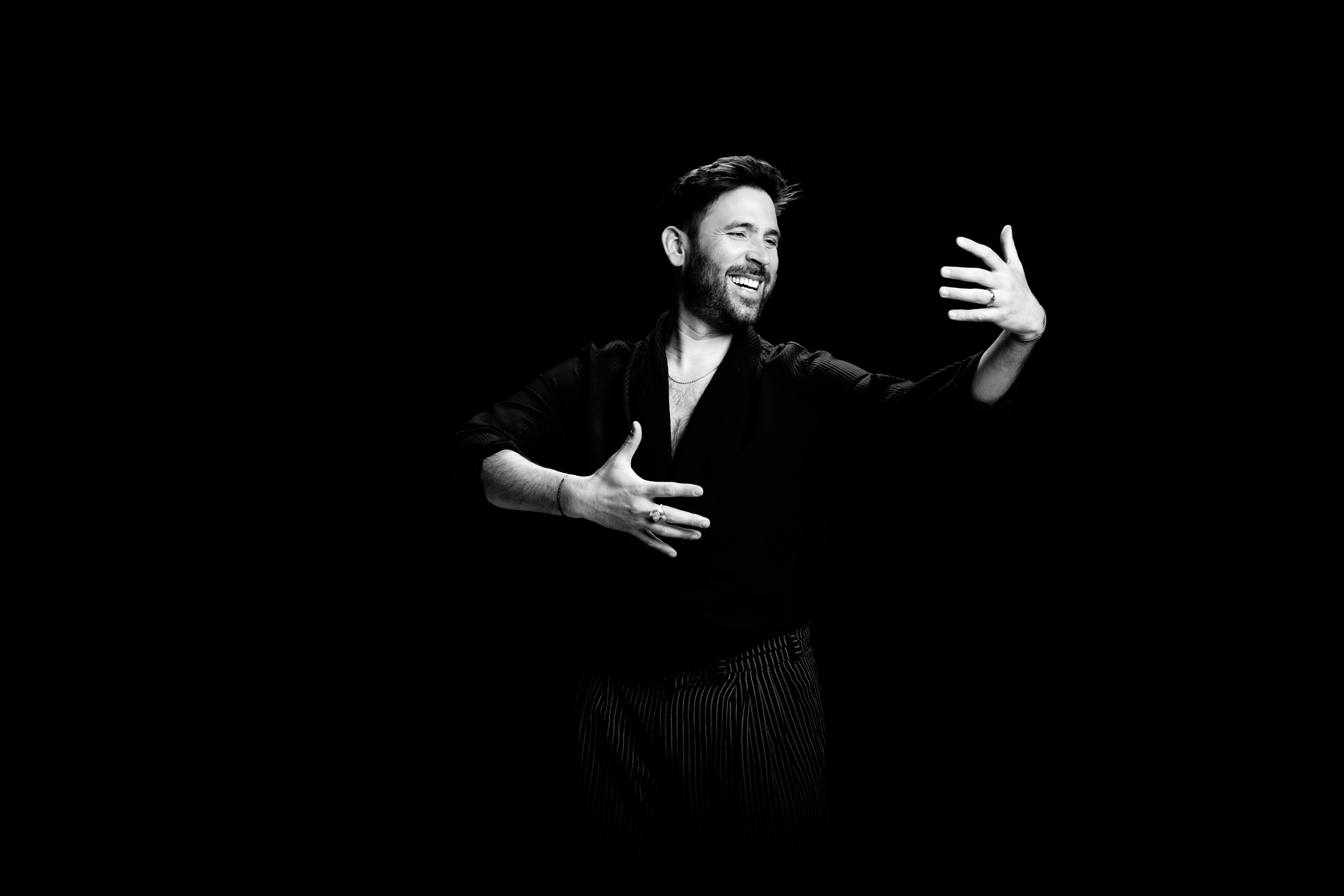 Rolando Guy, lyric tenor, in a studio portrait