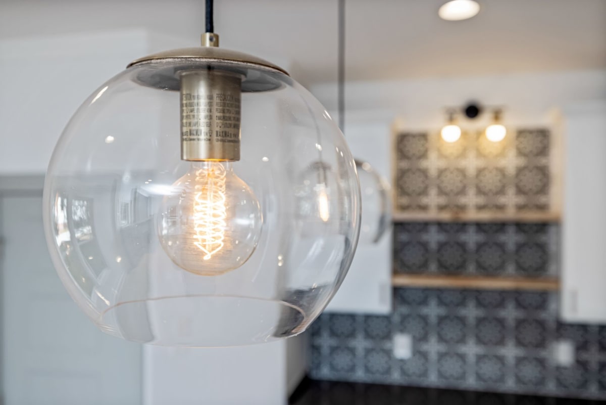 Modern kitchen with layered lighting in a St Helens home