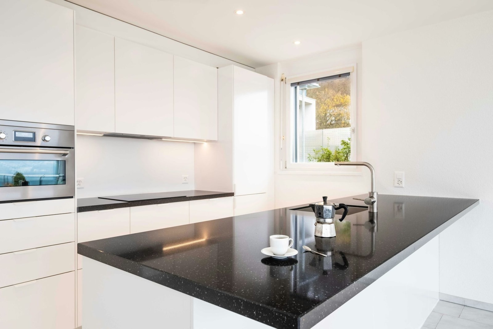 Built-in oven and hob installed in a fitted kitchen in Bath