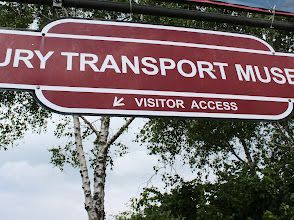 A red and white sign for the jury transport museum
