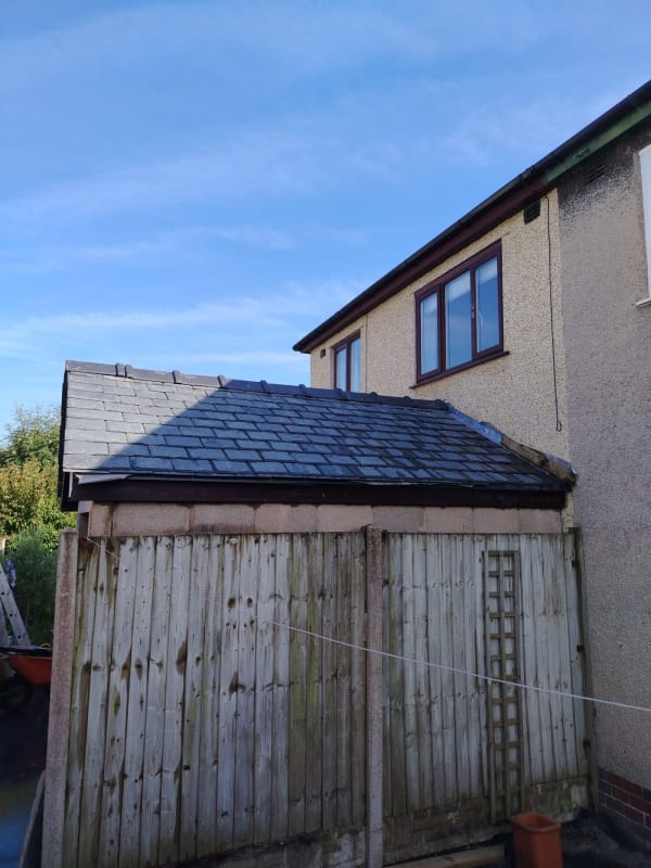Newly laid natural slate roof with lead flashing completed by Roof Repairs Southport