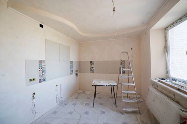 Repaired and redecorated ceiling after the flat roof above it was replaced