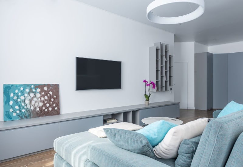 Media wall with built-in shelving and display niches