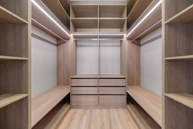 Walk-in wardrobe shelving with LED strip lighting