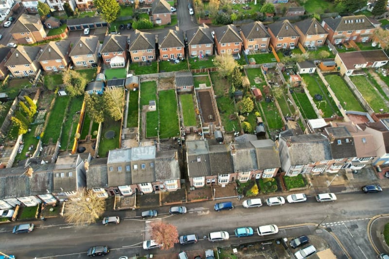 Aerial view of rear extensions and outriggers behind Mansfield terraced houses