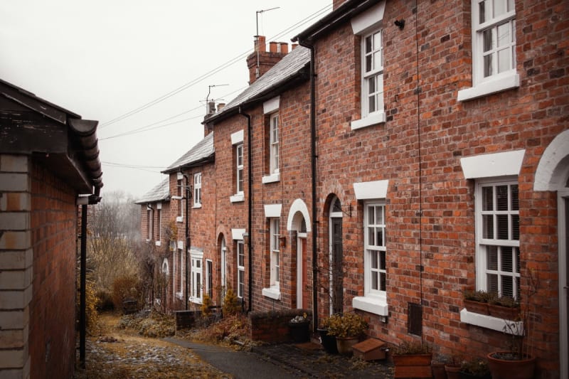 Row of colliery-era houses in the Mansfield area showing a mix of original and replaced roofs