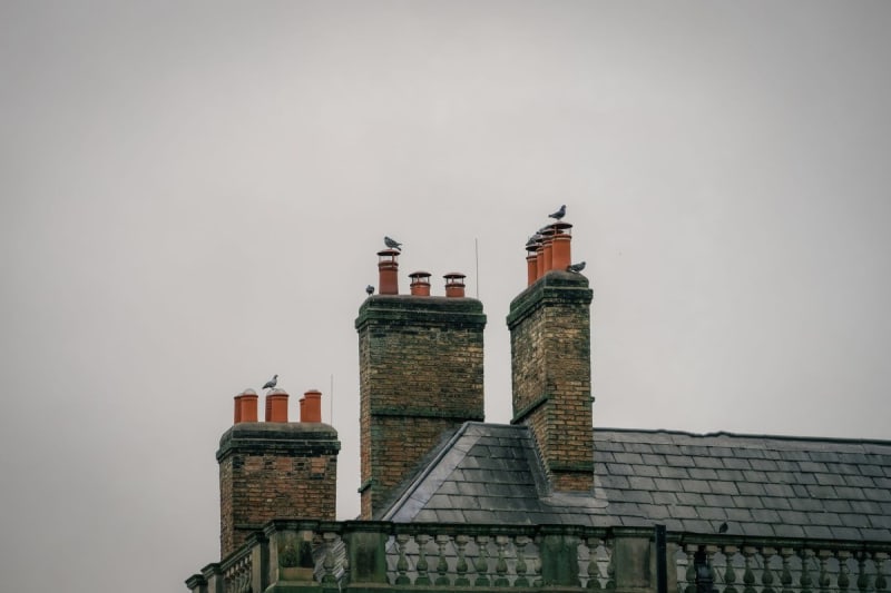 Chimney stacks and pots along the rooftops of Mansfield terraces