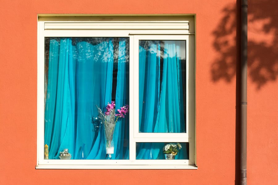 Aluminium casement window interior view with natural light in Exeter home