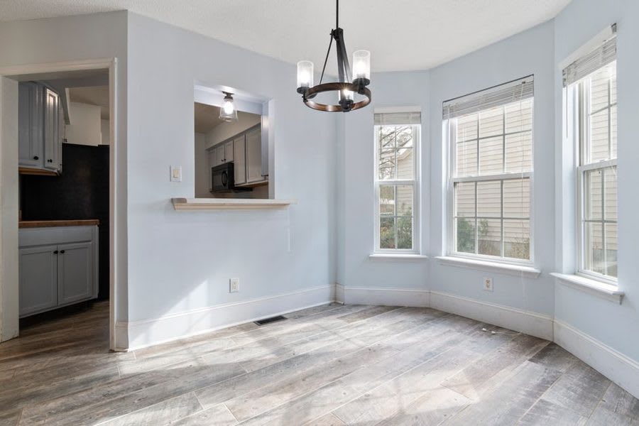 Bay window interior creating a bright light-filled living room