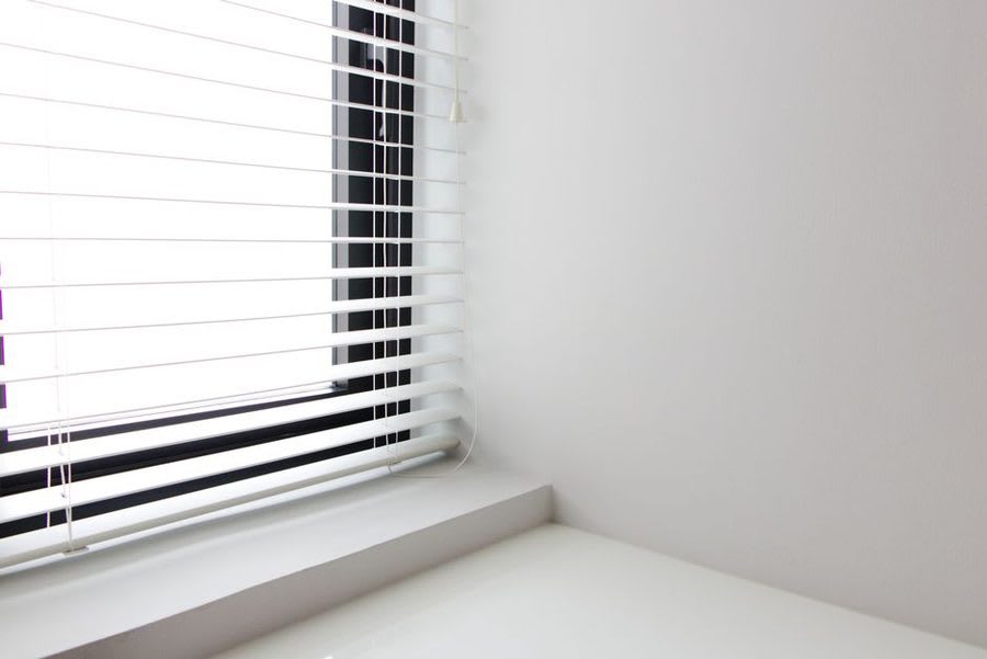 Clean internal window reveal and sill detail after bay window replacement