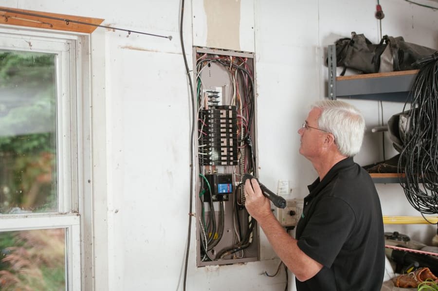 Electrician testing the fixed wiring and EICR on a leased Bristol unit