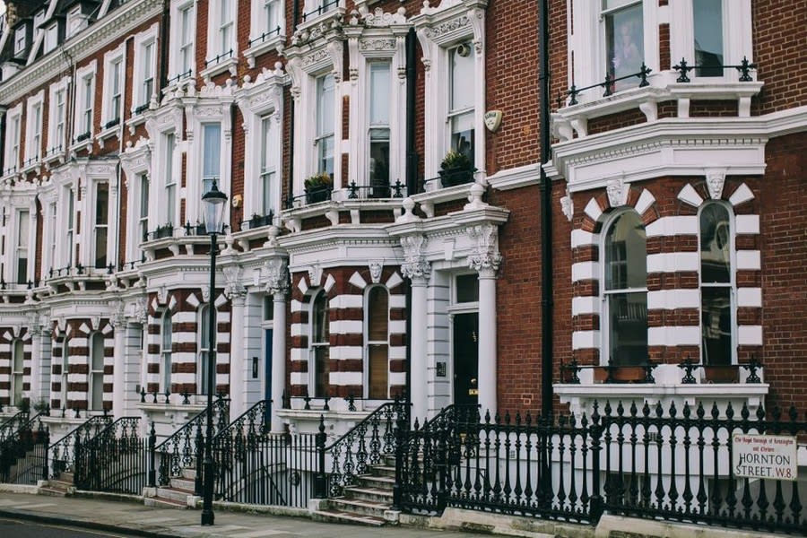 Row of classic Victorian townhouses in a UK city conservation area street
