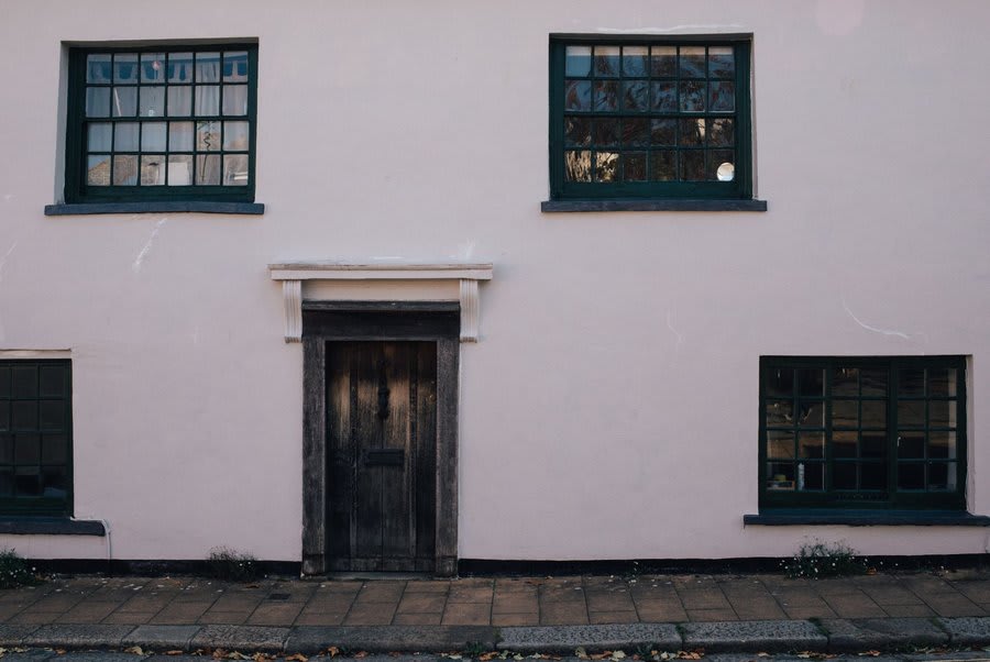 Close-up of anthracite grey uPVC casement window frame on Exeter property