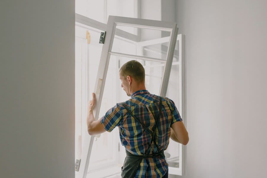 Front door installation in progress at an Exeter property
