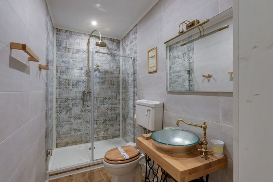 Shower room fitted into the eaves of a loft conversion in Cornwall