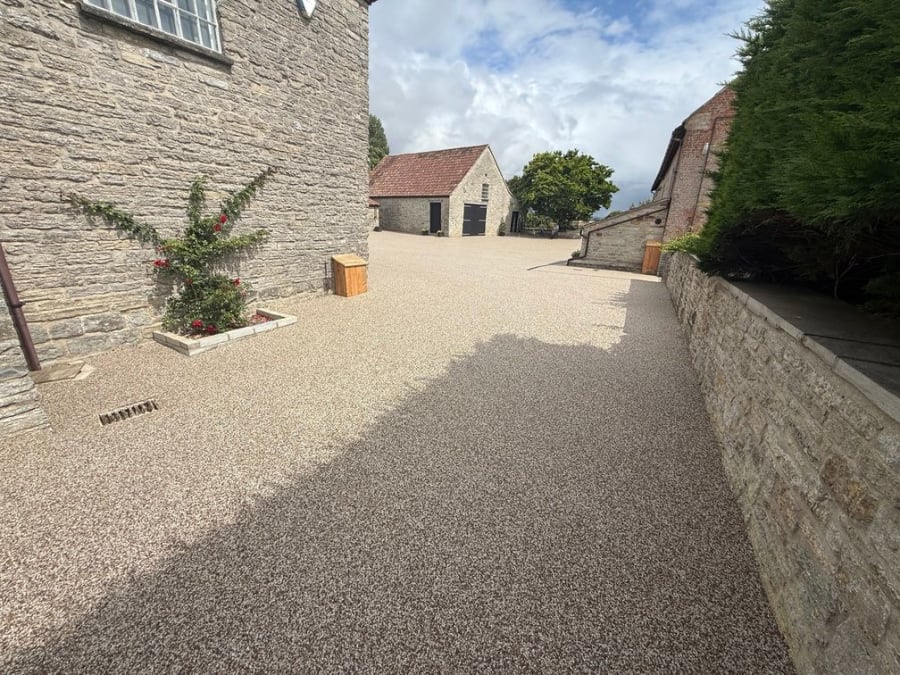 Photo taken from low down of the resin driveway outside a house