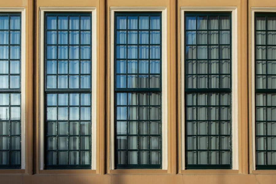Original timber sash window detail on a listed building in Exeter showing period proportions