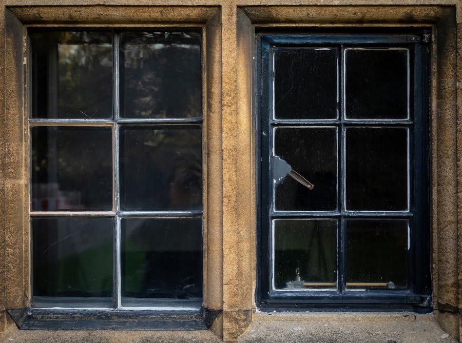 Window frame detail showing condition assessment for repair or replacement decision