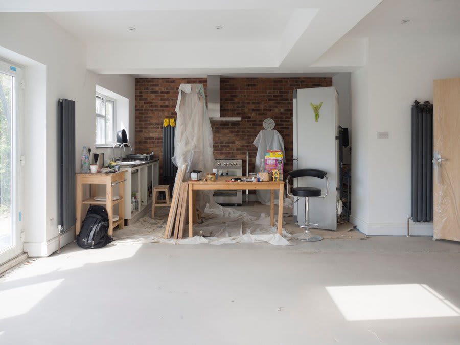 Bright kitchen dining extension in Exeter with roof lantern providing overhead light