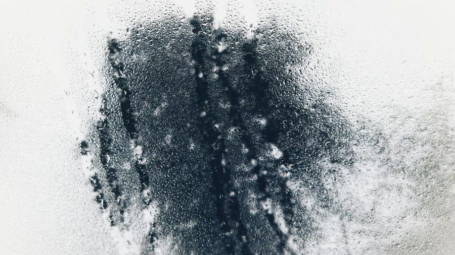 Black mould growth caused by persistent condensation from a cold deck flat roof