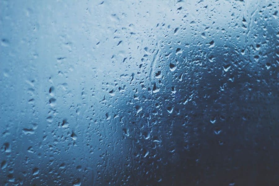 Condensation forming on cold glass, the same mechanism that occurs inside a cold deck flat roof