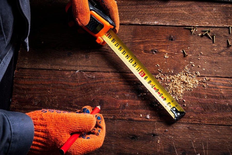 Measuring insulation thickness for a flat roof to meet Part L requirements