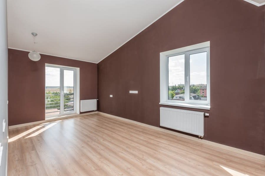 A room beneath a flat roof where condensation problems commonly show up