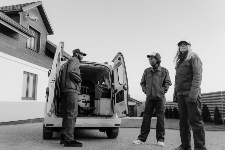 A flat roofing crew loading up before a job in Weston-super-Mare
