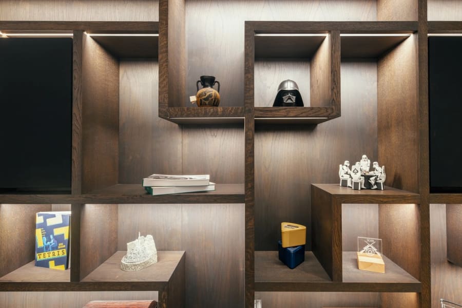 Dark oak display shelving built into an alcove in Torquay