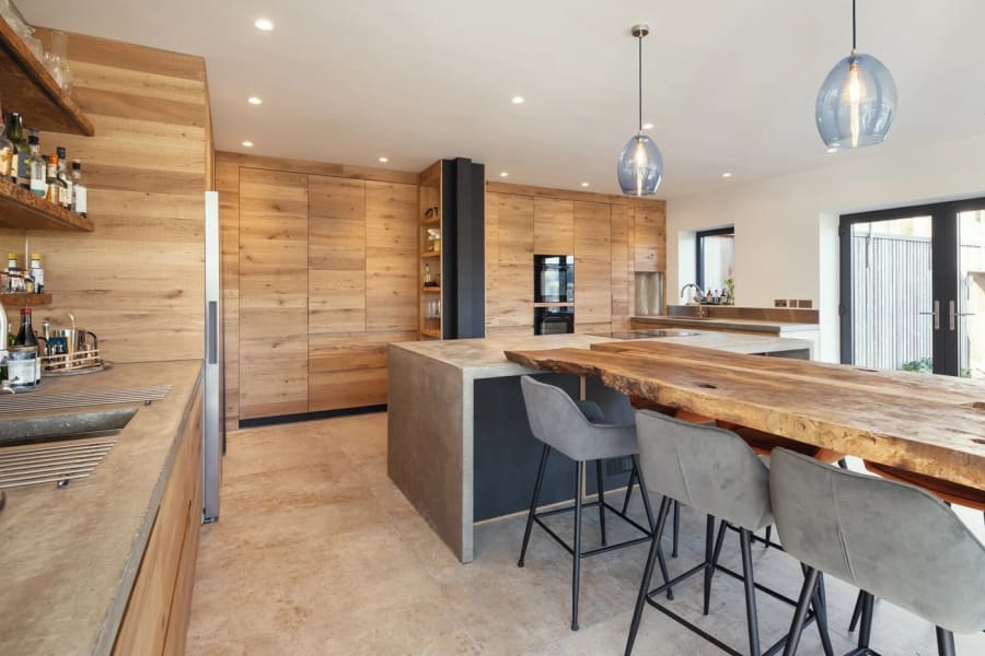 Bespoke oak kitchen with a breakfast bar, made and fitted for a Torquay home