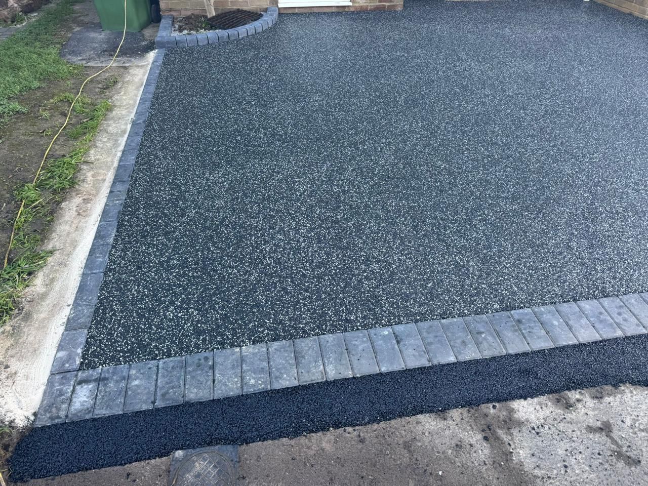 Smooth finish resin driveway in Lincoln