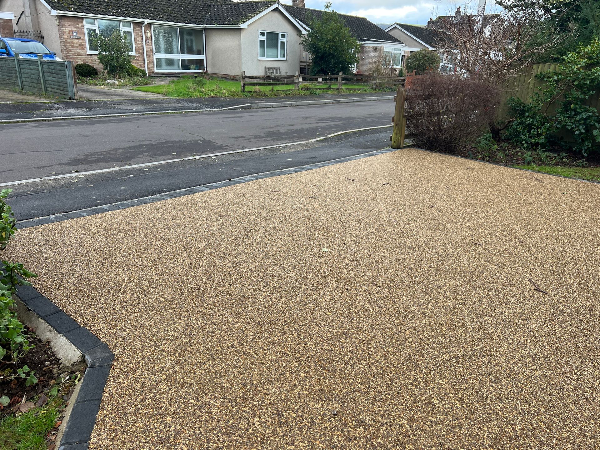 The Chemistry Behind Durable Driveways: How Resin Binding Creates Lasting Surfaces