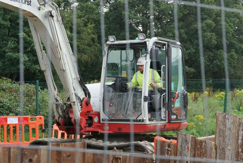 Heffernan worker operating a digger