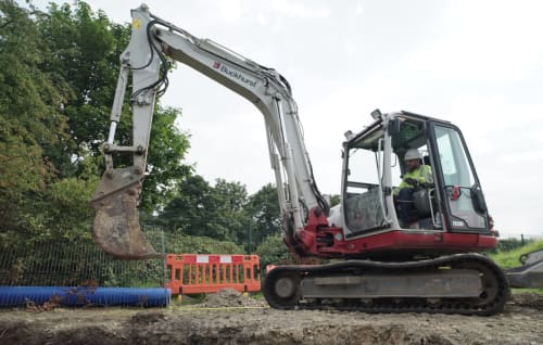 Heffernan worker operating a digger