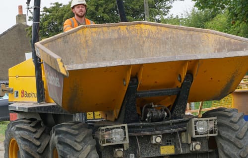 Heffernan worker operating a digger