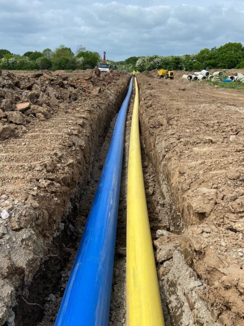 multi utility groundwork neatly laid gas pipe water pipe electric wire 