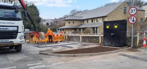 ev electric vehicle charging point installation workmen high vis