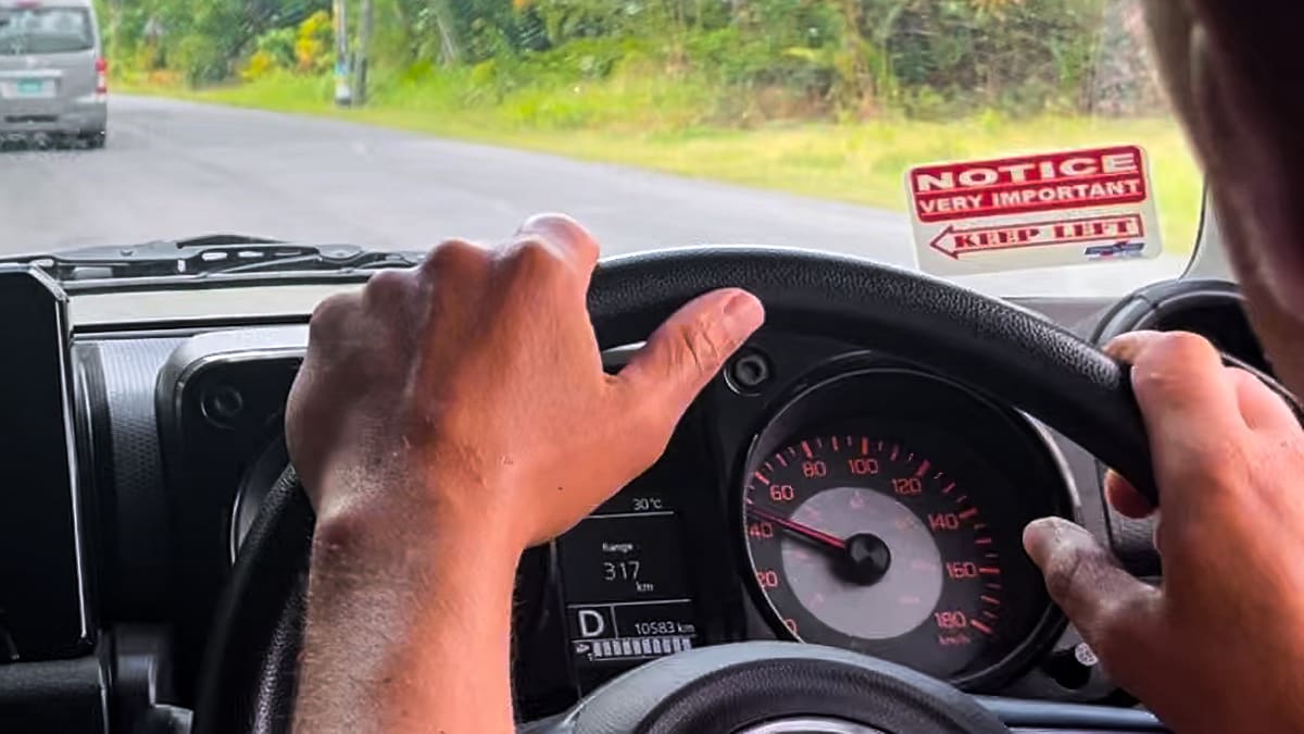KEEP LEFT sticker on the dashboard of our right-hand-drive rental car in St. Lucia