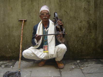 Krishna Bahadur Gayak practicing Karkha before participating