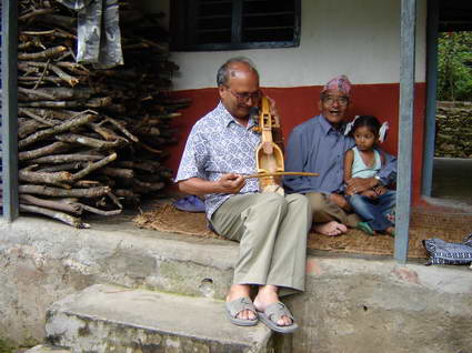 Dr. Bandhu learning Sarangi