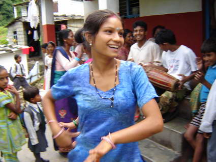 Min Kumari dancing during birth of a baby