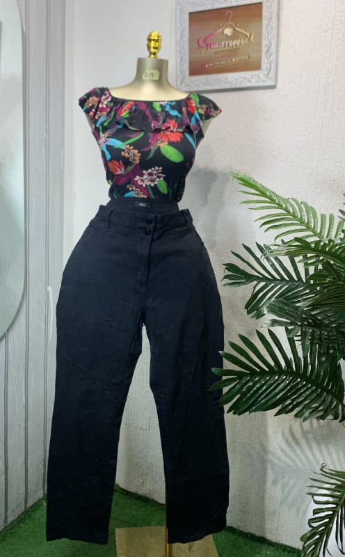 Vibrant Floral Ruffle Top & Black High-Waist Trousers
